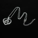 Load image into Gallery viewer, Dog Cat Paw Print in Cut Out Heart Crystal Paved Pendant Necklace Animal Pet Jewelry for Women
