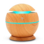 Load image into Gallery viewer, USB Aroma Humidifier Aromatherapy Wood Grain 7 Color LED Lights Electric Aromatherapy Essential Oil Aroma Diffuser 130ml humidif
